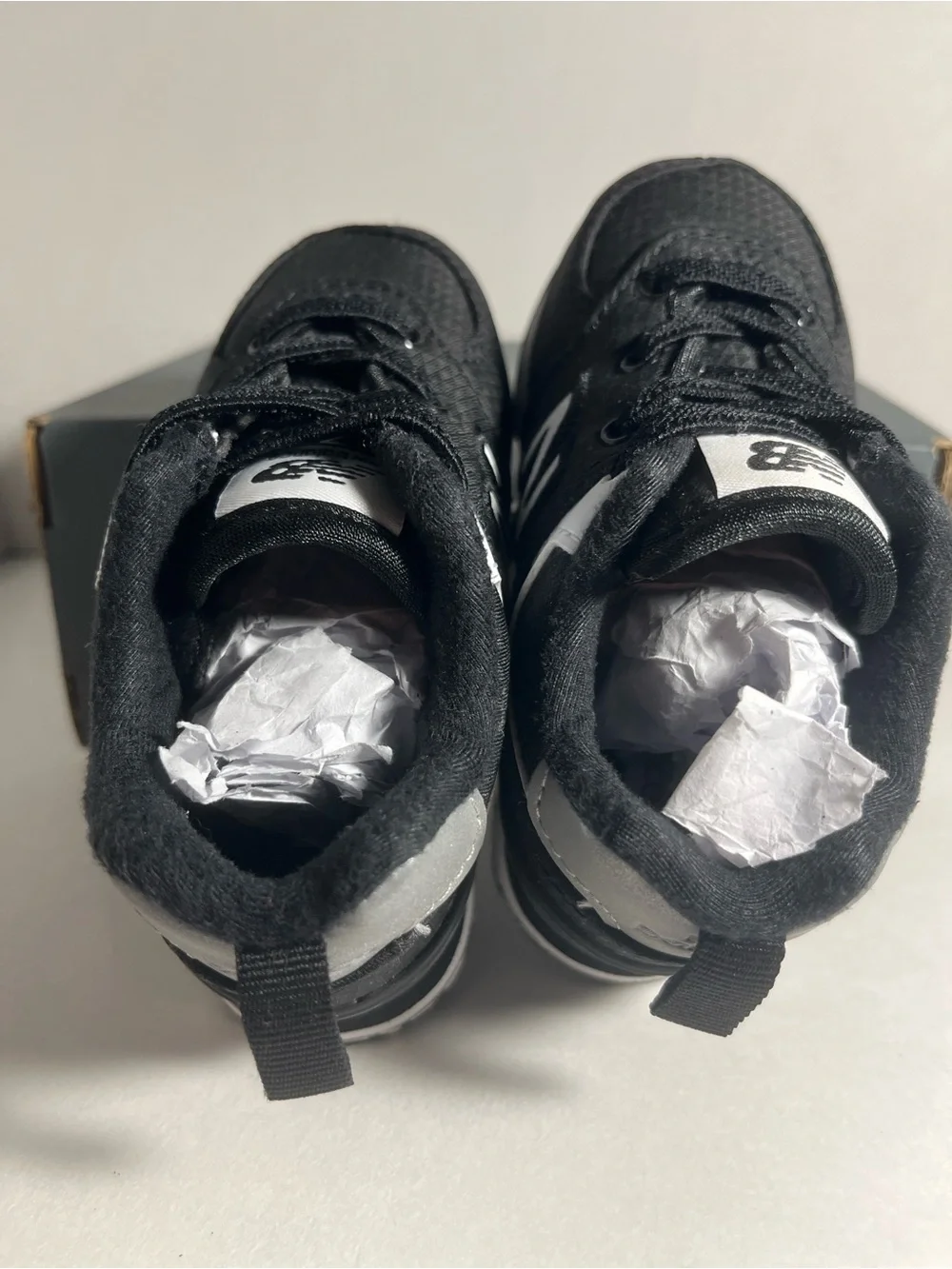 New Balance Kids Black and White Athletic Sneakers with 'N' Logo